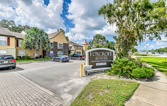 the preserve sign with apartments in the background