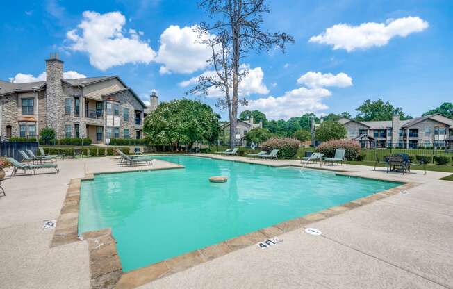 the preserve at ballantyne commons pool with apartment buildings