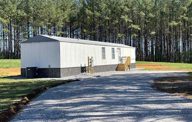 3 BED 2 BATH MOBILE HOME IN GATED COUNTRY SETTING LOCATED IN DENTON AREA