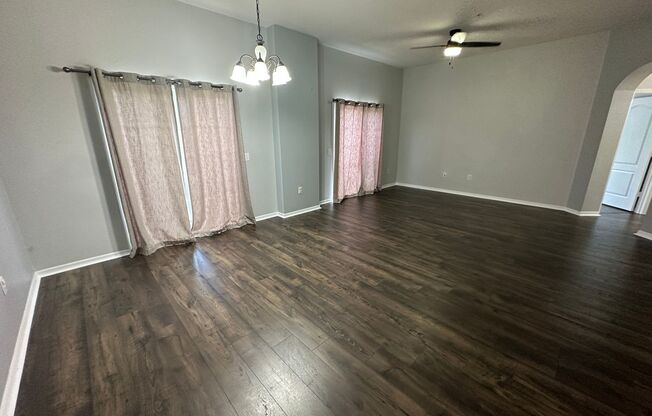 Charming 2-Bedroom Townhome in Highly Desirable Winter Garden | Gated Community with Abundant Amenities | Fully Tiled, Newer Appliances & Inside Laundry | One-Car Garage Included