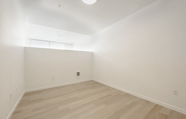 Large room with wood floors