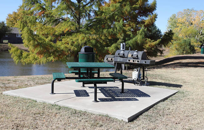 picnic and grilling area by the stocked fishing pond