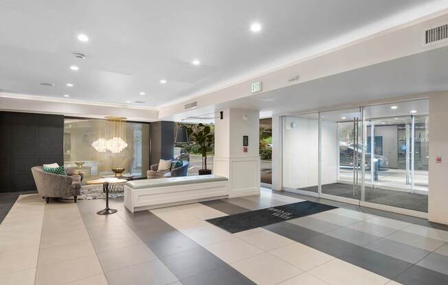 the lobby or reception area of a hotel with a reception desk