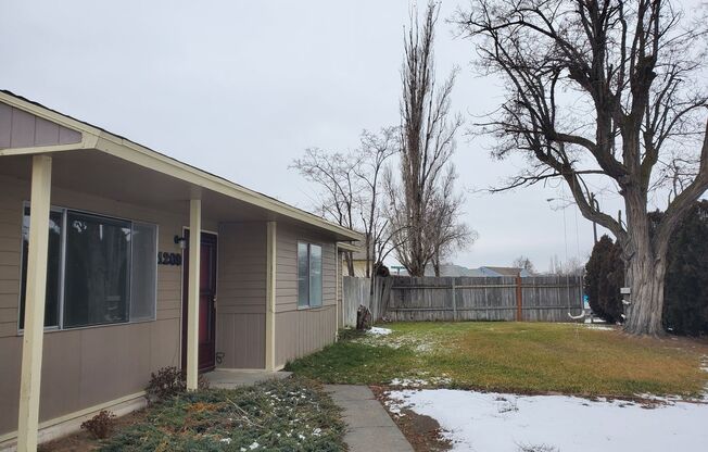 3 bedroom 1 bath home with 1 car garage and fenced yard