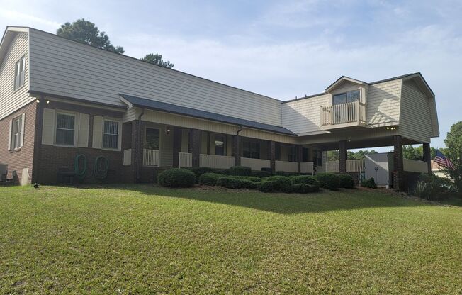 Large Family Home located on the Golf course at Carolina Trace! 7 bedroom, 5.5 Baths!