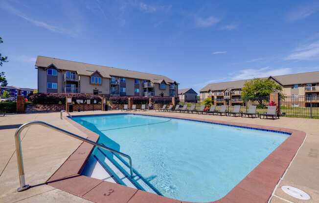 Surrounded by the beauty of the clubhouse grounds, the sparkling pool invites residents to relax and enjoy leisurely moments.
