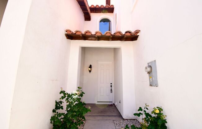 Charming Mediterranean-Style Townhome in Gated Community
