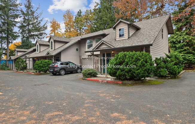 Charming SE Townhome With Attached Garage & Park Like Setting! New Photos| Video! Tour Today!