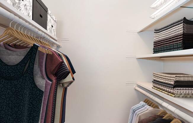 A white shelf with a stack of books on it.