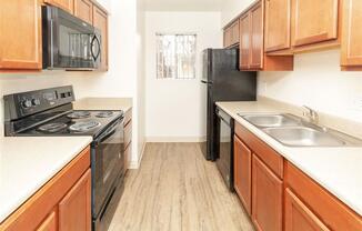 Modern Kitchen With Custom Cabinet at Cimarron Place Apartments, Tucson, AZ, 85712