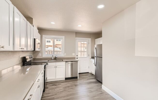 Hale neighborhood duplex with a large patio space for entertaining or relaxing.