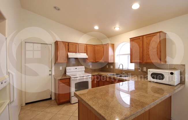 1140 S CHOLLA ST