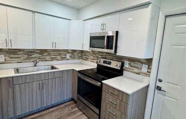 ROISMAN, AVRAHAM M TRSTEE ETAL - 100 SW 9 St