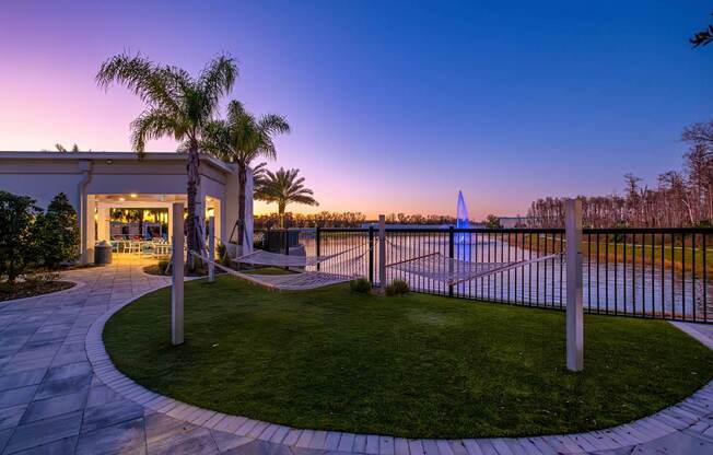 A house with a palm tree in front of it.