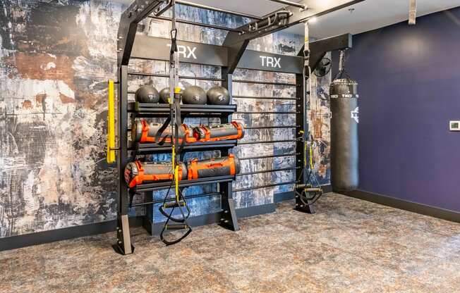 a display of fire equipment in a room with a blue wall