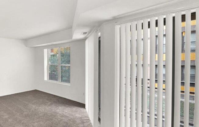 a living room with a white radiator and a window