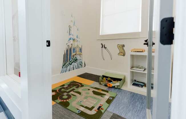 Playroom in Clubhouse at Parc at Day Dairy Apartments and Townhomes, Draper, UT, 84020