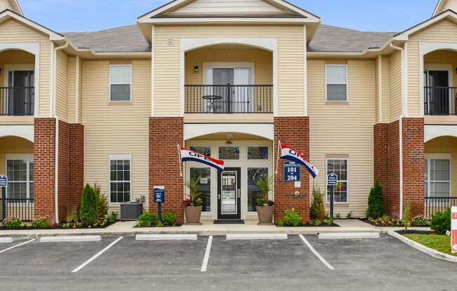 Exterior View Of Austin Place Apartments' Clubhouse Entrance