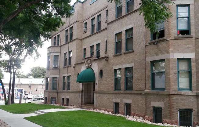 Welcome to your new home in this charming brick building, surrounded by nature.