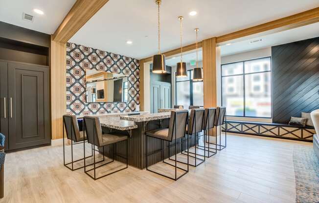 a kitchen and dining area with a large table and chairs
