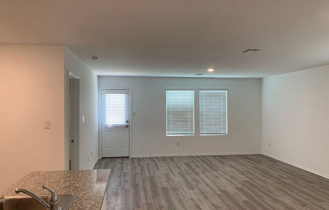 Luxury Vinyl Plank (No Carpet) / Fridge Included  /Granite Countertops Throughout / Instant Hot Water / CISD