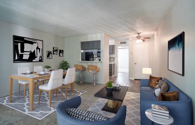 Staged and furnished dining and living room at Treehouse Apartments in Albuquerque, New Mexico