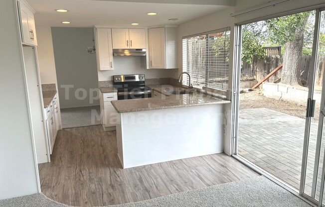 **Updated 4 bed / 2 bath House in Quiet Neighborhood - Available NOW**