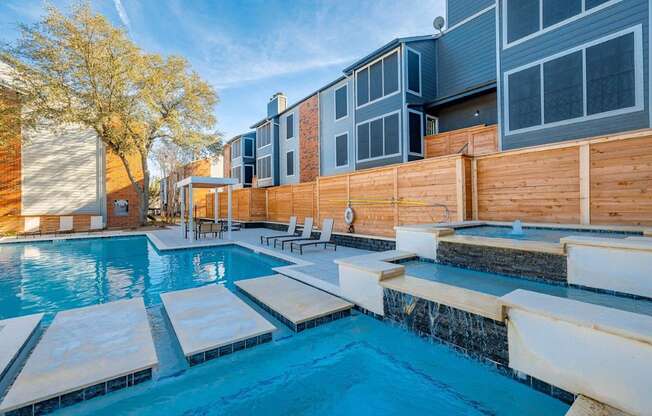 The Monet Apartments in Dallas, Texas Pool with Lounge Chairs