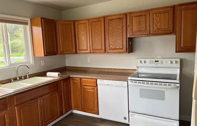 Fenced corner lot centrally located 2 bedroom 1 bath House