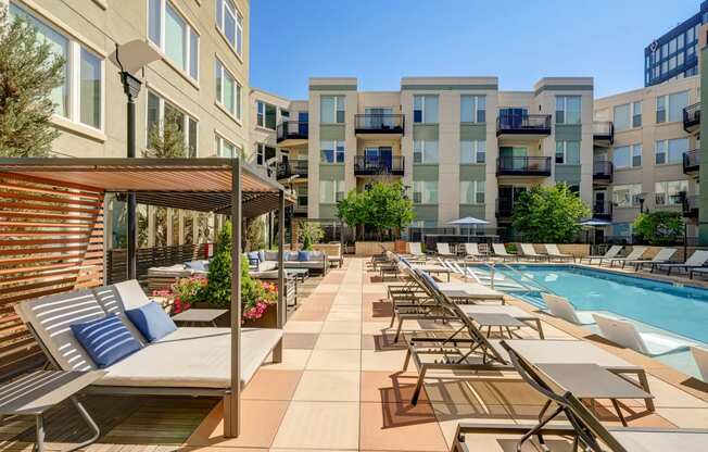 our apartments have a large pool and lounge chairs