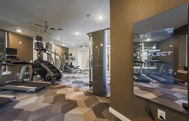 fitness center at Aspire at 610 apartments