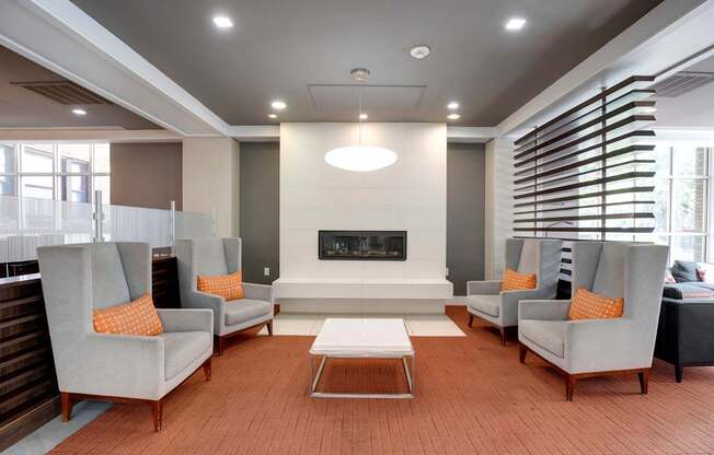 room with couches and a table and a fireplace at The Argonne Apartments, Washington, DC, 20009