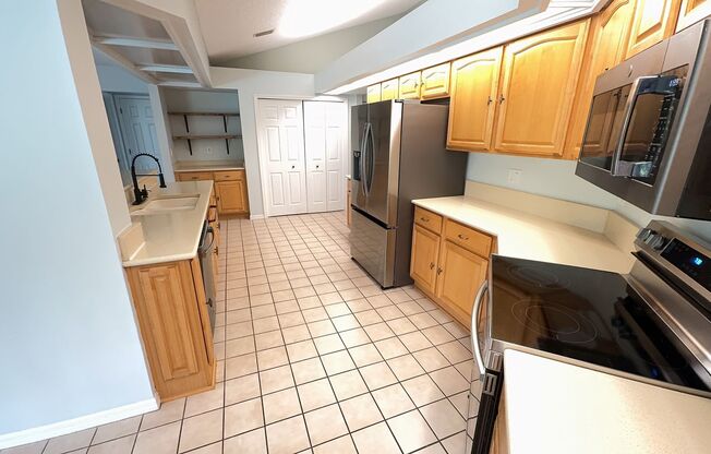 For Rent: A dazzling 5-bedroom, 3-bathroom sanctuary in the coveted gated community of Hunter's Green!