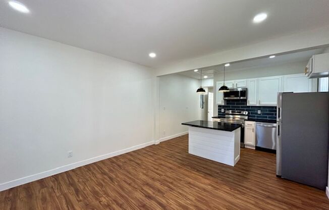 Charming 1 Bedroom, 1 Bathroom Duplex- Fully Remodeled!!