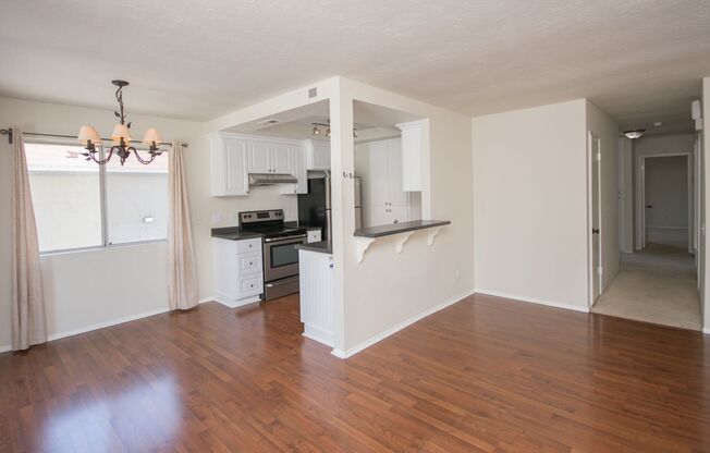 Spacious Upstairs 3BR Condo With 2 Car Garage!!