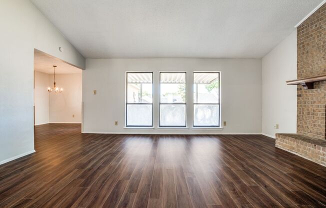 Charming 3BD, 2BA Home: Fresh Paint, New Flooring, Spacious Yard, Prime Location!