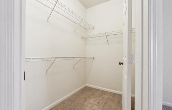 A spacious walk-in closet at the Ballantrae apartments in Florida