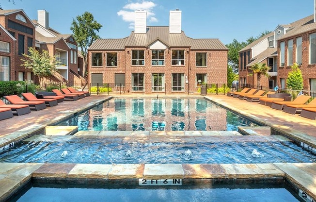 Lakewood on the Trail poolside view with lounge chairsLakewood on the Trail poolside view with lounge chairs Downtown Dallas Apartment with pool rental