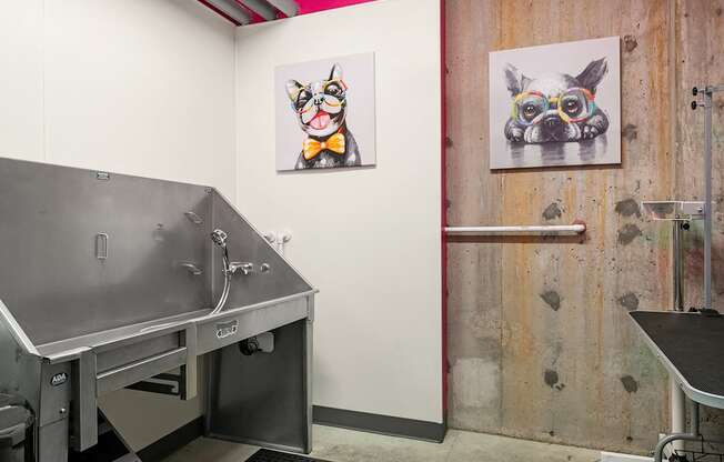 A dog with glasses is painted on the wall.