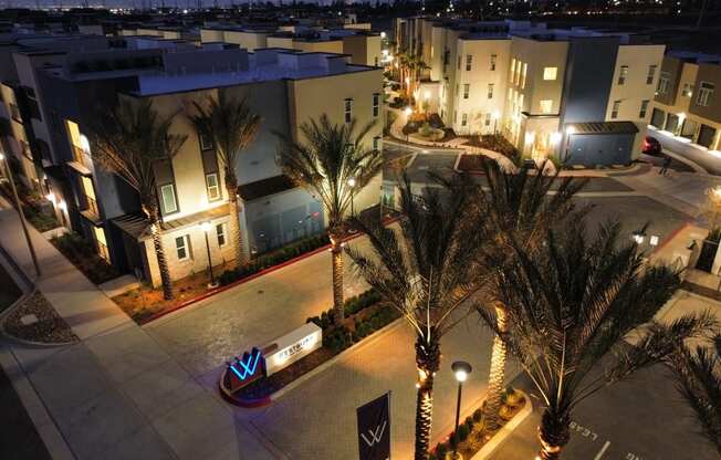 an aerial view of a street with apartments at night  at Westbury Apartments, Rancho Cucamonga, CA