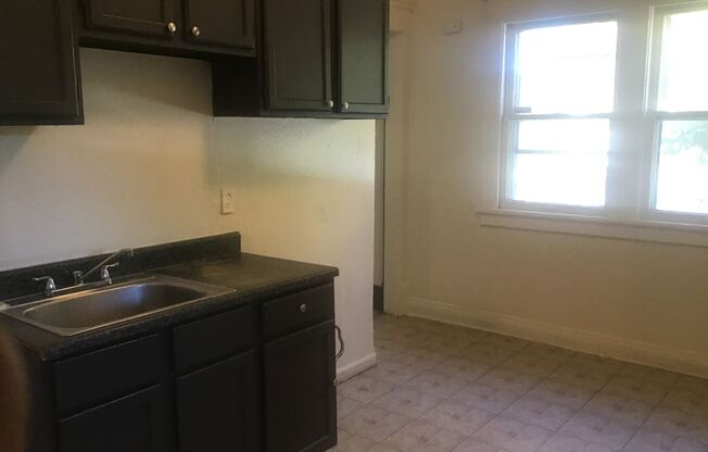 3 bedroom 1.5 bathroom single family home with off street parking