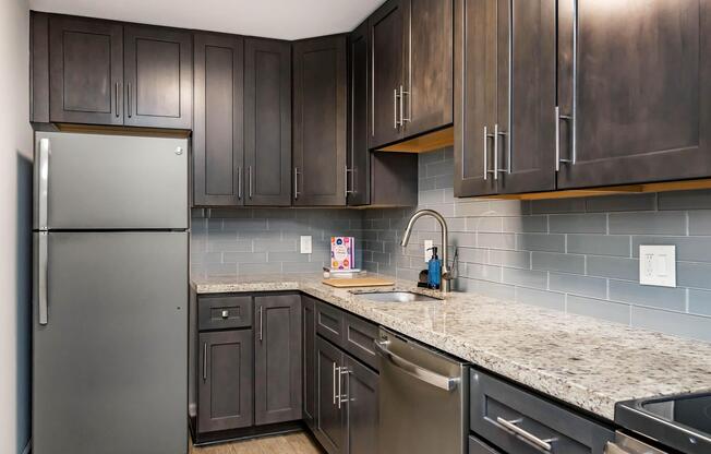 a modern kitchen with stainless steel appliances