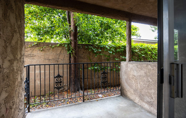 a view of the courtyard from the front door of the house