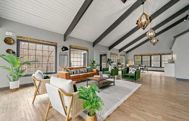 A modern living room with wooden floors and furniture.