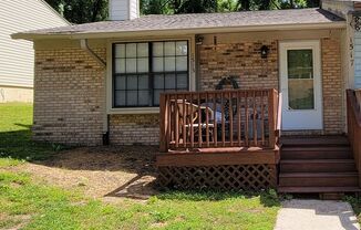2 bedroom duplex for rent July 6, 2024, wood floors, fenced back yard renting for $1200 per month