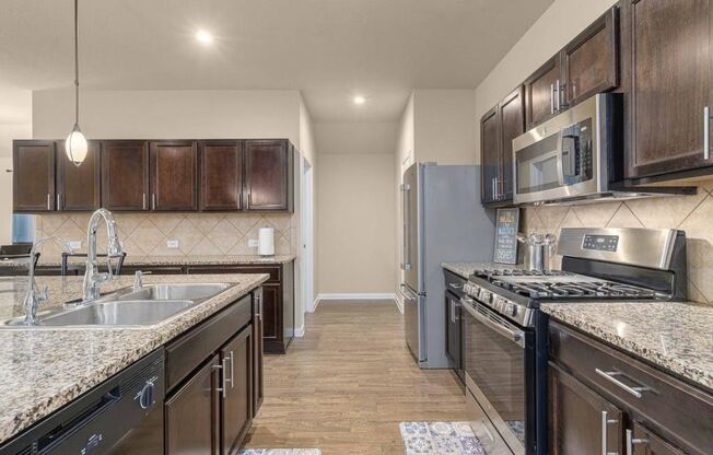Beautiful Four Bedroom Home on Corner Lot Available June 1st