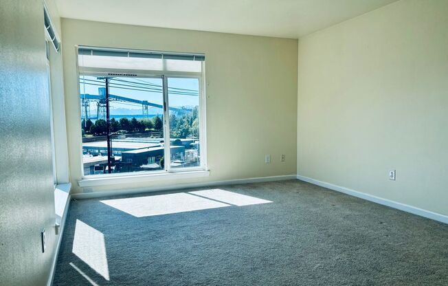 Top Floor West Facing 1bd/1ba Condo with Sound Water Views!