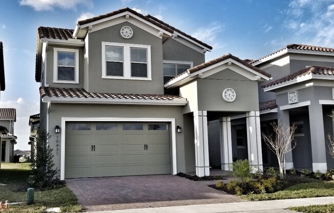 Stunning home in the luxurious Eagle Creek Golf Community of Lake Nona! Lawn service included!