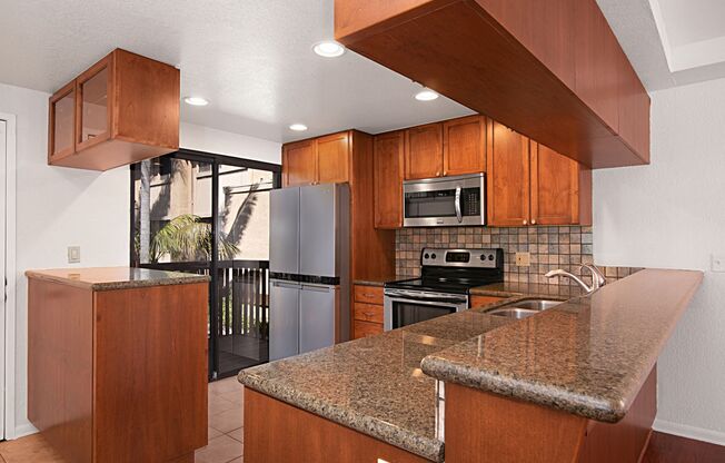Rarely available Clairemont 3-story end unit townhome.