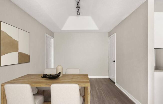 A dining room with a wooden table and white chairs.